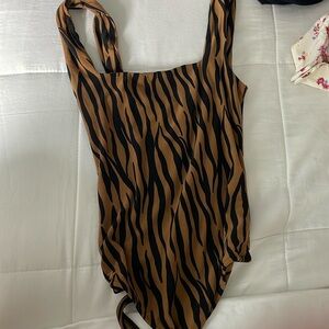 Show me your mumu , cheetah bodysuit, and size extra small